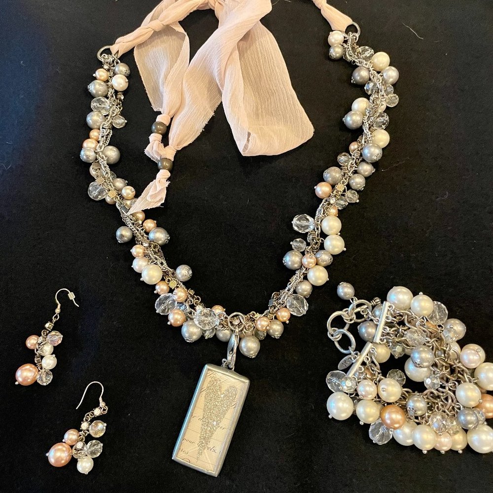 Jewel Kade necklace, bracelet, earrings and charm
